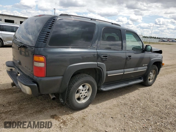 2003 Chevrolet Tahoe LS with VIN 1GNEK13ZX3J311862, listed as a Copart auction lot 54872545 with 198,579 mi miles and Salvage Title. Bid and sale history available at DreamBid. Image 3.