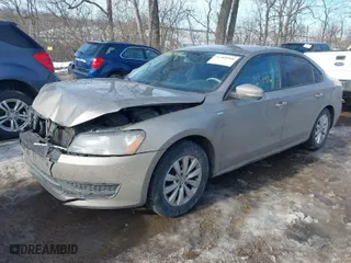 2015 Volkswagen Passat 1.8T S with VIN 1VWAT7A35FC005051, listed as a IAAI auction lot 41368998 with 165,097 mi miles. Bid and sale history available at carsss.com. Image 2.
