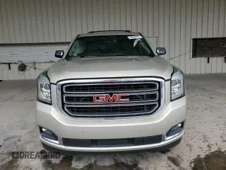 2015 GMC Yukon SLE with VIN 1GKS1AKC5FR120713, listed as a Copart auction lot 48009325 with 133,372 mi miles and Salvage Title. Bid and sale history available at carsss.com. Image 5.