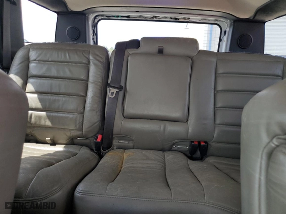 2005 Hummer H2 SUV with VIN 5GRGN23U15H130452, listed as a Copart auction lot 68099154 with 151,369 mi miles and Salvage Title. Bid and sale history available at carsss.com. Image 10.