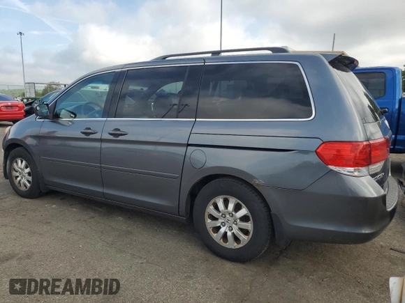 2010 Honda Odyssey EX with VIN 5FNRL3H46AB098512, listed as a Copart auction lot 56481655 with 171,632 mi miles and Salvage Title. Bid and sale history available at DreamBid. Image 2.