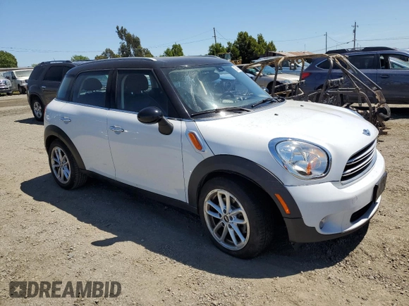 2015 MINI Countryman with VIN WMWZB3C55FWR44759, listed as a Copart auction lot 55836815 with 102,472 mi miles and Salvage title. Bid and sale history available at DreamBid. Image 4.
