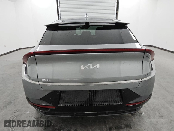 2023 Kia EV6 Wind with VIN KNDC34LA1P5612737, listed as a Copart auction lot 77999304 with 7,608 mi miles and Salvage Title. Bid and sale history available at carsss.com. Image 6.