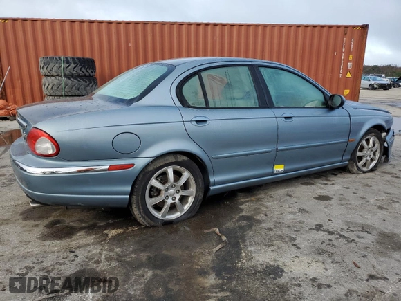 2004 Jaguar X-Type z VIN SAJEB52D54XD68737, wystawiony jako Copart lot #85168784 z przebiegiem 150 975 mil mil oraz Szkoda całkowita • Salvage title. Historia ofert i sprzedaży dostępna na DreamBid. Obrazek 3.