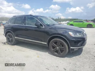 2017 Volkswagen Touareg Wolfsburg Edition with VIN WVGRF7BP6HD004806, listed as a Copart auction lot 61754565 with 160,012 mi miles and Clean title. Bid and sale history available at DreamBid. Image 4.
