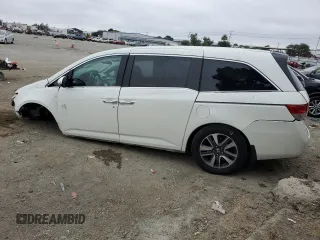 2014 Honda Odyssey Touring z VIN 5FNRL5H91EB089813, wystawiony jako Copart lot #58674275 z przebiegiem Nie podano mil oraz Szkoda całkowita • Salvage title. Historia ofert i sprzedaży dostępna na DreamBid. Obrazek 2.