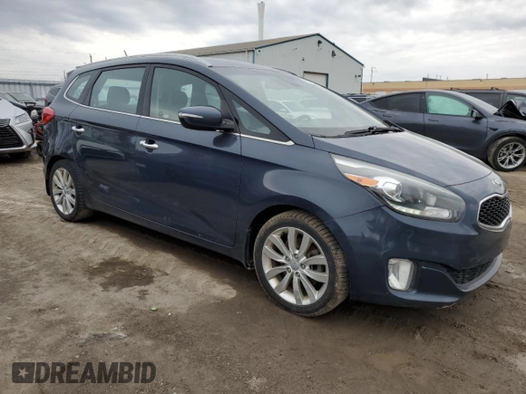 2014 Kia Rondo EX with VIN KNAHU8A39E7037977, listed as a Copart auction lot 51824125 with 292,042 mi miles and Clean Title. Bid and sale history available at carsss.com. Image 4.