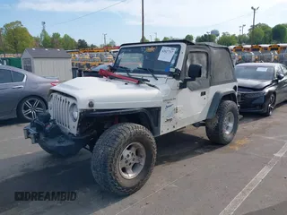 1998 Jeep Wrangler Sport with VIN 1J4FY19S5WP788331, listed as a IAAI auction lot 42027717 with 201,119 mi miles and . Bid and sale history available at DreamBid. Image 2.
