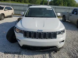 2019 Jeep Grand Cherokee Laredo E with VIN 1C4RJEAG2KC732645, listed as a Copart auction lot 53336495 with 76,221 mi miles and Salvage title. Bid and sale history available at DreamBid. Image 5.