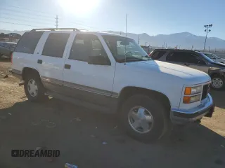1999 GMC Denali z VIN 1GKEK13R5XR503159, wystawiony jako Copart lot #89018655 z przebiegiem 229 819 mil mil oraz Czysty tytuł • Clean title. Historia ofert i sprzedaży dostępna na DreamBid. Obrazek 4.