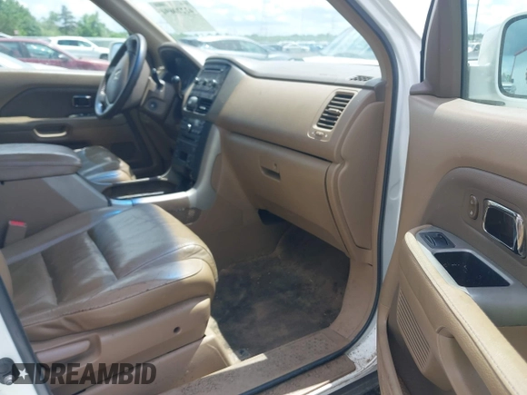 2007 Honda Pilot EX-L z VIN 5FNYF18627B024506, wystawiony jako IAAI lot #42220694 z przebiegiem 258 535 mil mil oraz . Historia ofert i sprzedaży dostępna na DreamBid. Obrazek 5.