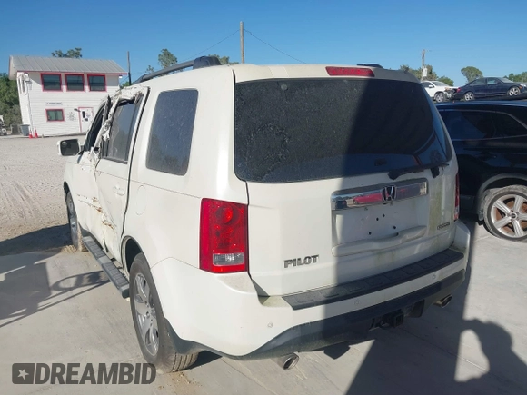 2015 Honda Pilot Touring with VIN 5FNYF3H98FB017564, listed as a IAAI auction lot 41587390 with 162,676 mi miles. Bid and sale history available at carsss.com. Image 3.