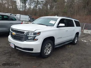 2016 Chevrolet Suburban LT with VIN 1GNSKHKC2GR182080, listed as a IAAI auction lot 41666445 with 148,661 mi miles. Bid and sale history available at carsss.com. Image 2.