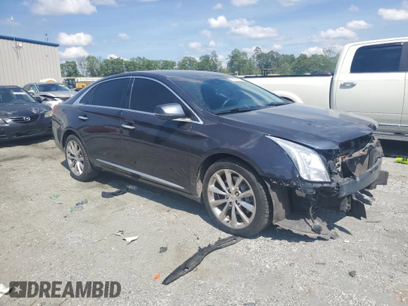 2014 Cadillac XTS Luxury with VIN 2G61M5S36E9248959, listed as a Copart auction lot 53971125 with 129,327 mi miles and Salvage title. Bid and sale history available at DreamBid. Image 4.