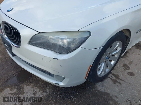 2011 BMW 7 Series 750Li with VIN WBAKB8C57BCY66558, listed as a IAAI auction lot 41494697 with 102,560 mi miles. Bid and sale history available at carsss.com. Image 6.
