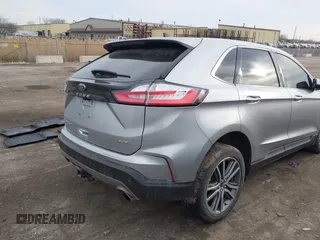 2021 Ford Edge Titanium z VIN 2FMPK4K94MBA32297, wystawiony jako IAAI lot #41834740 z przebiegiem 45 908 mil mil oraz . Historia ofert i sprzedaży dostępna na DreamBid. Obrazek 4.
