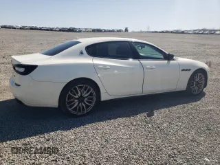 2014 Maserati Quattroporte GTS z VIN ZAM56PPA3E1074957, wystawiony jako Copart lot #52321115 z przebiegiem 113 584 mil mil oraz Szkody całkowita. Historia ofert i sprzedaży dostępna na DreamBid. Obrazek 3.