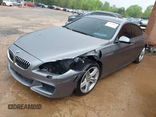 2016 BMW 6 Series 640i xDrive with VIN WBA6D2C58GGT66160, listed as a IAAI auction lot 41130666 with 102,064 mi miles and . Bid and sale history available at carsss.com. Image 18.
