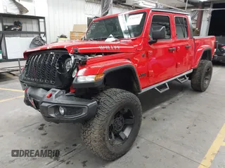 2022 Jeep Gladiator Altitude z VIN 1C6HJTAGXNL117353, wystawiony jako IAAI lot #42427921 z przebiegiem 28 801 mil mil oraz . Historia ofert i sprzedaży dostępna na DreamBid. Obrazek 17.