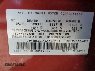 2006 Mazda 3 S Grand Touring z VIN JM1BK344161540154, wystawiony jako Copart lot #57724315 z przebiegiem 116 468 mil mil oraz Szkoda całkowita • Salvage title. Historia ofert i sprzedaży dostępna na DreamBid. Obrazek 13.