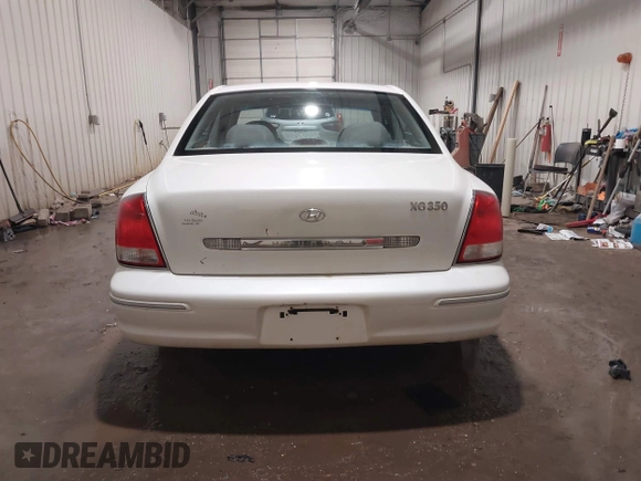 2002 Hyundai XG L z VIN KMHFU45EX2A180204, wystawiony jako IAAI lot #41472564 z przebiegiem 148 333 mil mil oraz . Historia ofert i sprzedaży dostępna na DreamBid. Obrazek 16.