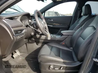2020 Cadillac XT4 AWD Sport z VIN 1GYFZFR47LF137814, wystawiony jako Copart lot #47848325 z przebiegiem 24 696 mil mil oraz Szkoda całkowita • Salvage title. Historia ofert i sprzedaży dostępna na DreamBid. Obrazek 7.