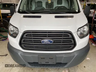 2016 Ford Transit Cargo z VIN 1FTYE1YM3GKB18575, wystawiony jako IAAI lot #42734024 z przebiegiem 186 138 mil mil oraz . Historia ofert i sprzedaży dostępna na DreamBid. Obrazek 7.