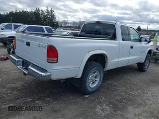1997 Dodge Dakota z VIN 1B7GG23X5VS242535, wystawiony jako IAAI lot #41608146 z przebiegiem 125 189 mil mil oraz . Historia ofert i sprzedaży dostępna na DreamBid. Obrazek 4.
