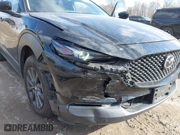 2022 Mazda CX-30 S with VIN 3MVDMBALXNM402265, listed as a IAAI auction lot 41458605 with 76,291 mi miles and . Bid and sale history available at carsss.com. Image 6.