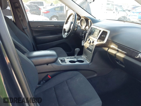 2012 Jeep Grand Cherokee Laredo with VIN 1C4RJFAG5CC234382, listed as a IAAI auction lot 42010153 with 185,078 mi miles. Bid and sale history available at carsss.com. Image 5.
