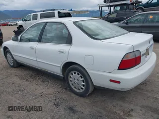 1997 Honda Accord with VIN 1HGCD5555VA127980, listed as a IAAI auction lot 42412772 with 235,367 mi miles and . Bid and sale history available at DreamBid. Image 3.
