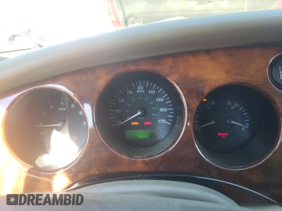 1999 Jaguar XK z VIN SAJGX2043XC032962, wystawiony jako Copart lot #49312155 z przebiegiem 74 662 mil mil oraz Szkoda całkowita • Salvage title. Historia ofert i sprzedaży dostępna na DreamBid. Obrazek 9.