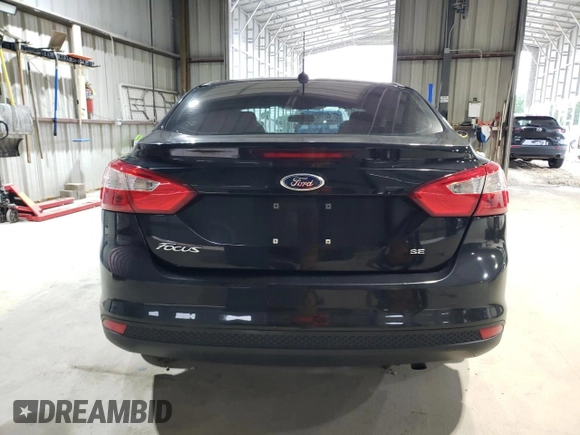 2013 Ford Focus SE z VIN 1FADP3F29DL373961, wystawiony jako Copart lot #59277175 z przebiegiem 134 980 mil mil oraz Szkoda całkowita • Salvage title. Historia ofert i sprzedaży dostępna na DreamBid. Obrazek 6.