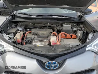 2018 Toyota RAV4 Hybrid SE z VIN JTMJJREV0JD246230, wystawiony jako Copart lot #89095135 z przebiegiem Nie podano mil oraz Szkoda całkowita • Salvage title. Historia ofert i sprzedaży dostępna na DreamBid. Obrazek 13.