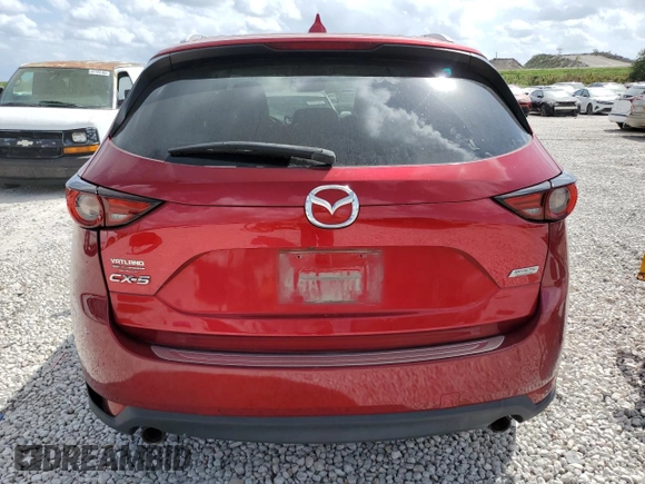 2018 Mazda CX-5 Grand Touring with VIN JM3KFADM7J0399895, listed as a Copart auction lot 47598265 with 0 mi miles and Salvage Title. Bid and sale history available at carsss.com. Image 6.