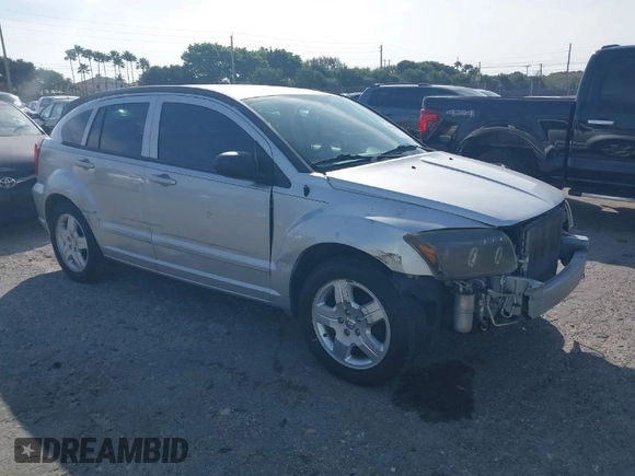 2009 Dodge Caliber SXT with VIN 1B3HB48A39D142674, listed as a IAAI auction lot 41642867 with 156,504 mi miles and . Bid and sale history available at carsss.com. Image 1.