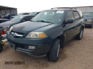 2006 Acura MDX Touring w/Navi with VIN 2HNYD18876H523408, listed as a IAAI auction lot 41756670 with 219,796 mi miles. Bid and sale history available at carsss.com. Image 2.