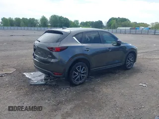 2018 Mazda CX-5 Touring with VIN JM3KFACM9J1348054, listed as a IAAI auction lot 42043458 with 120,177 mi miles. Bid and sale history available at carsss.com. Image 4.
