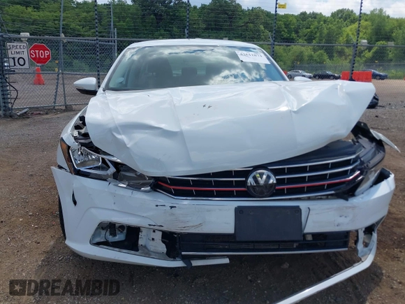 2017 Volkswagen Passat S with VIN 1VWAT7A30HC016932, listed as a IAAI auction lot 42611874 with 100,959 mi miles and . Bid and sale history available at DreamBid. Image 12.