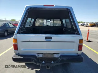 1991 Toyota Pickup z VIN JT4RN13PXM6031833, wystawiony jako Copart lot #58953095 z przebiegiem 252 237 mil mil oraz Czysty tytuł • Clean title. Historia ofert i sprzedaży dostępna na DreamBid. Obrazek 6.