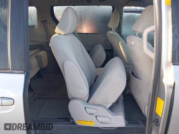 2014 Toyota Sienna LE AAS with VIN 5TDKK3DC1ES520561, listed as a IAAI auction lot 41959565 with 115,908 mi miles and . Bid and sale history available at carsss.com. Image 8.
