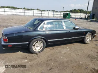 1996 Jaguar XJ with VIN SAJKX6747TC764559, listed as a Copart auction lot 48501775 with Not provided miles and Salvage title. Bid and sale history available at DreamBid. Image 3.