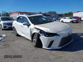 2024 Lexus RX 350h with VIN 2T2BBMCA9RC057830, listed as a IAAI auction lot 41423283 with 5,522 mi miles and . Bid and sale history available at DreamBid. Image 6.