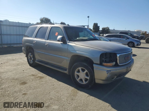 2003 GMC Yukon Denali z VIN 1GKEK63U93J339277, wystawiony jako Copart lot #42454275 z przebiegiem Nie podano mil oraz Szkody całkowita. Historia ofert i sprzedaży dostępna na DreamBid. Obrazek 4.