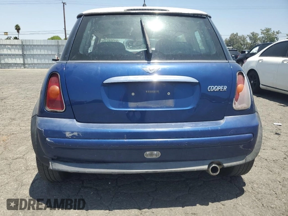 2004 MINI Hardtop z VIN WMWRC334X4TC51451, wystawiony jako Copart lot #61268235 z przebiegiem 149 750 mil mil oraz Szkoda całkowita • Salvage title. Historia ofert i sprzedaży dostępna na DreamBid. Obrazek 6.