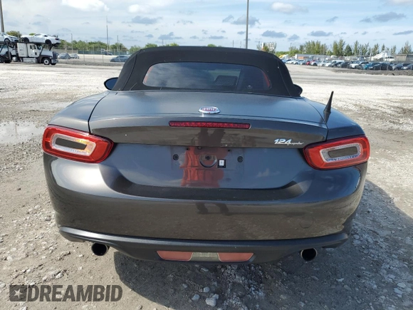 2017 FIAT 124 Spider Lusso z VIN JC1NFAEK7H0123436, wystawiony jako Copart lot #56169965 z przebiegiem 133 320 mil mil oraz Czysty tytuł • Clean title. Historia ofert i sprzedaży dostępna na DreamBid. Obrazek 6.