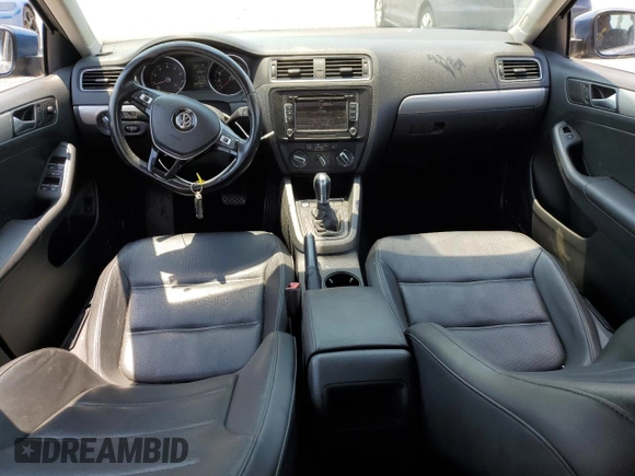 2015 Volkswagen Jetta SE with VIN 3VWD17AJ1FM421162, listed as a Copart auction lot 63873695 with 191,976 mi miles and Salvage title. Bid and sale history available at DreamBid. Image 8.