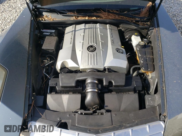 2004 Cadillac XLR z VIN 1G6YV34A845603654, wystawiony jako Copart lot #83494824 z przebiegiem 89 609 mil mil oraz Szkoda całkowita • Salvage title. Historia ofert i sprzedaży dostępna na DreamBid. Obrazek 11.
