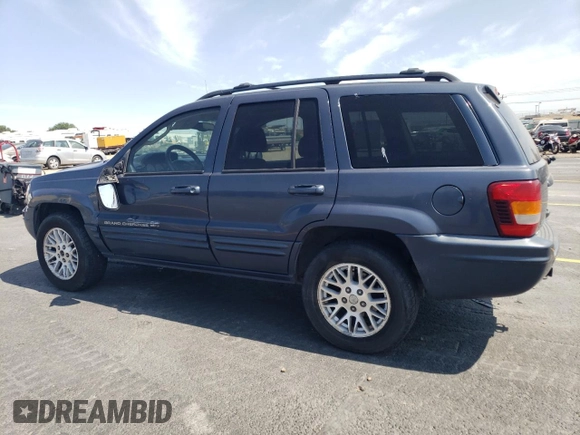 2004 Jeep Grand Cherokee Limited z VIN 1J4GW58S34C330987, wystawiony jako Copart lot #59089675 z przebiegiem 249 335 mil mil oraz Szkoda całkowita • Salvage title. Historia ofert i sprzedaży dostępna na DreamBid. Obrazek 2.