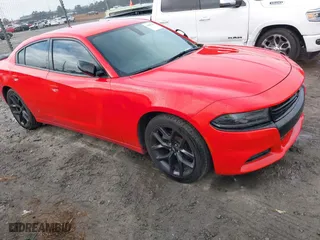 2021 Dodge Charger SXT with VIN 2C3CDXBG1MH625498, listed as a IAAI auction lot 41089186 with 94,417 mi miles. Bid and sale history available at carsss.com. Image 1.